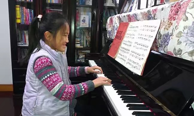 Iris playing piano 1